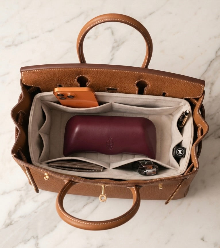 A Birkin 30 fitted with L'Insert in Béton.